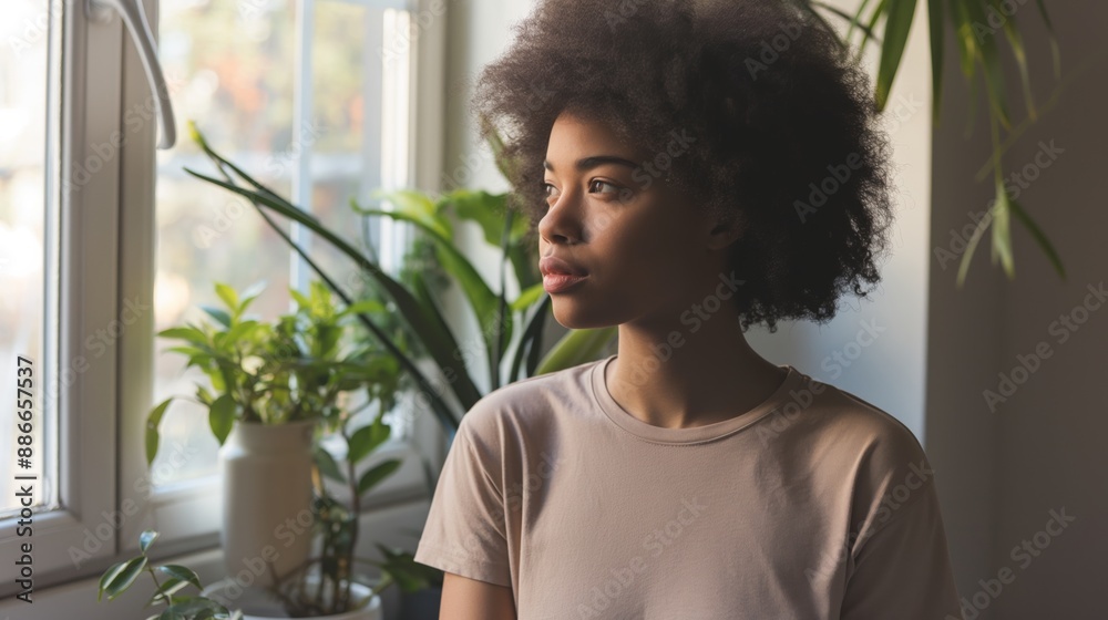 Contemplative Young African American Woman Pondering Indoors, Surrounded by Greenhouse Plants, Bright Natural Light, Ideal for Lifestyle and Inspirational Content Contemplative Young African American Woman Pondering Indoors, Surrounded by Greenhouse Plants, Bright Natural Light, Ideal for Lifestyle and Inspirational Content