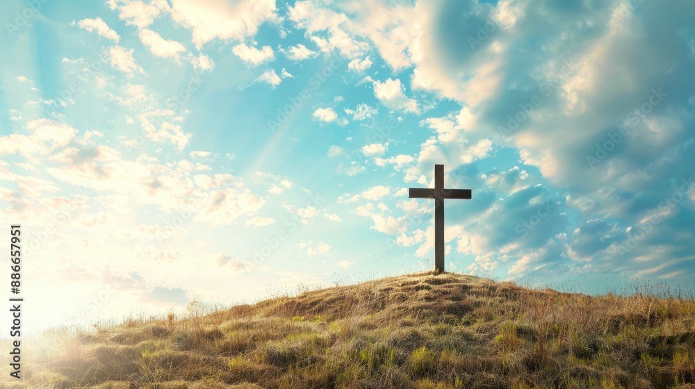 Christian cross on a hill with a clear sky background, space for inspirational text Christian cross on a hill with a clear sky background, space for inspirational text