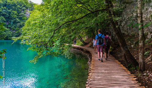  Tourist walking trail along a lake rich in fish. Plitvice lakes, Croatia
