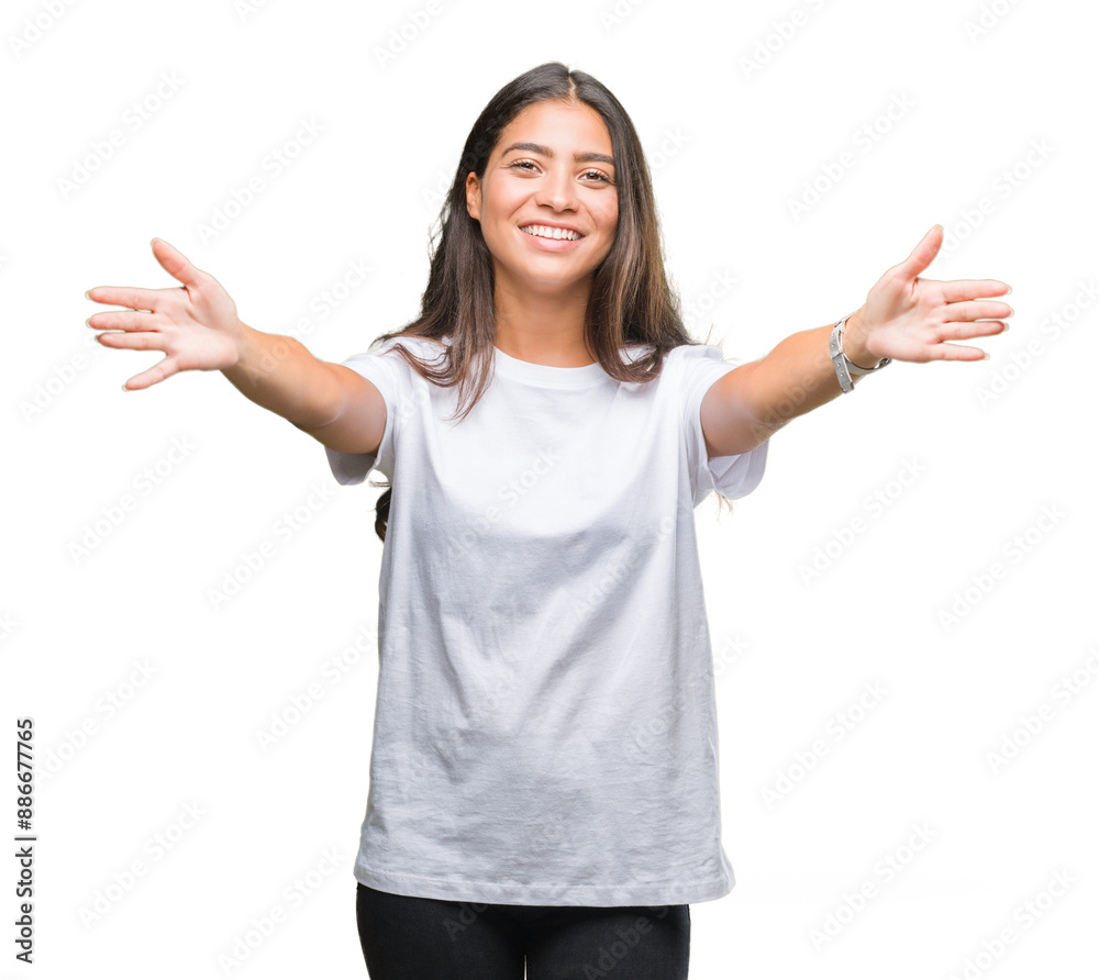 Young beautiful arab woman over isolated background looking at the camera smiling with open arms for hug. Cheerful expression embracing happiness. Young beautiful arab woman over isolated background looking at the camera smiling with open arms for hug. Cheerful expression embracing happiness.