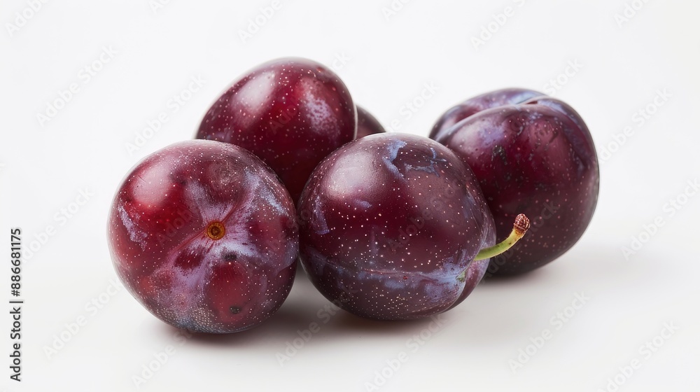 Close up of fresh plums in a studio Close up of fresh plums in a studio