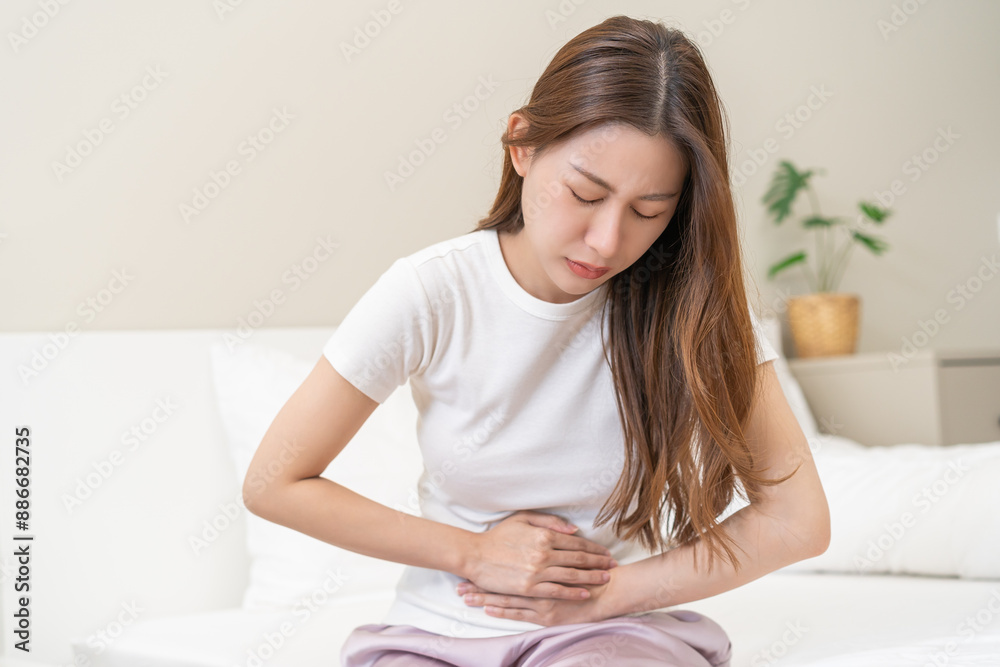 Flatulence ulcer, asian young woman, girl hands in belly, stomach pain from food poisoning, abdominal pain and digestive problem, gastritis or diarrhoea. Abdomen inflammation, menstrual period people. Flatulence ulcer, asian young woman, girl hands in belly, stomach pain from food poisoning, abdominal pain and digestive problem, gastritis or diarrhoea. Abdomen inflammation, menstrual period people.