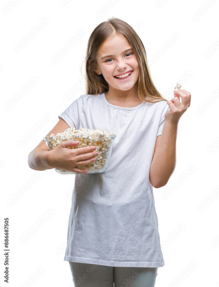 Young beautiful girl eating popcorn snack isolated background with a happy face standing and smiling with a confident smile showing teeth Young beautiful girl eating popcorn snack isolated background with a happy face standing and smiling with a confident smile showing teeth