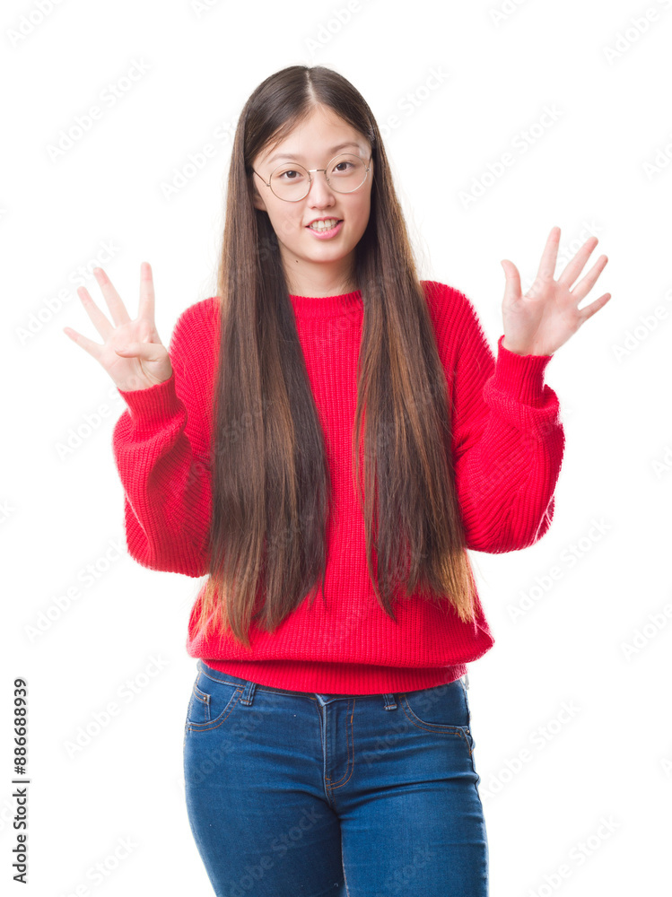 Young Chinese woman over isolated background wearing glasses showing and pointing up with fingers number nine while smiling confident and happy. Young Chinese woman over isolated background wearing glasses showing and pointing up with fingers number nine while smiling confident and happy.