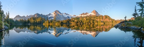 Serene Mountain Lake Reflection at Dawn