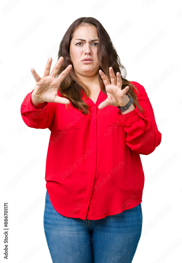 Beautiful plus size young business woman over isolated background afraid and terrified with fear expression stop gesture with hands, shouting in shock. Panic concept. Beautiful plus size young business woman over isolated background afraid and terrified with fear expression stop gesture with hands, shouting in shock. Panic concept.