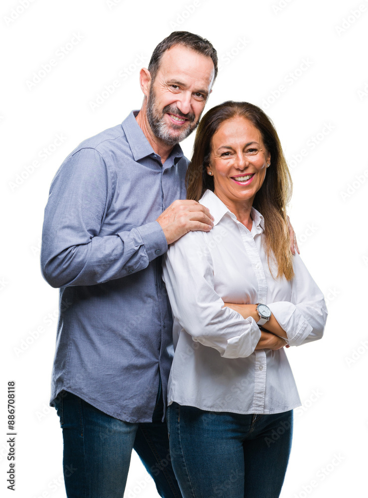 Middle age hispanic business couple over isolated background happy face smiling with crossed arms looking at the camera. Positive person. Middle age hispanic business couple over isolated background happy face smiling with crossed arms looking at the camera. Positive person.