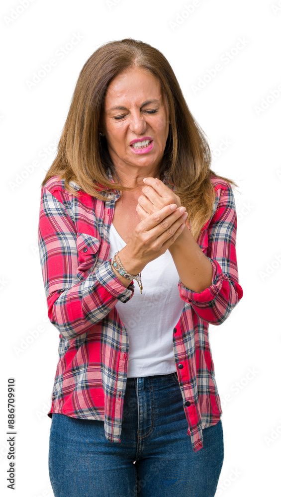Beautiful middle age woman wearing over isolated background Suffering pain on hands and fingers, arthritis inflammation Beautiful middle age woman wearing over isolated background Suffering pain on hands and fingers, arthritis inflammation