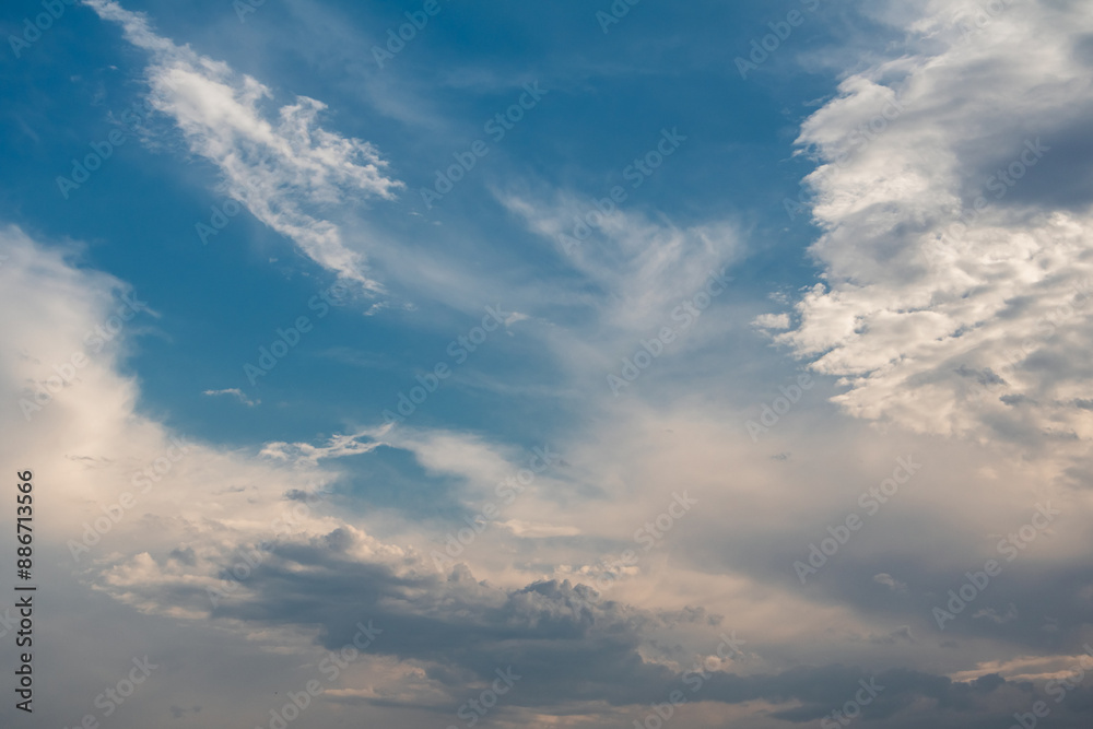 Fototapeta premium A blue sky with fluffy white clouds after the rain