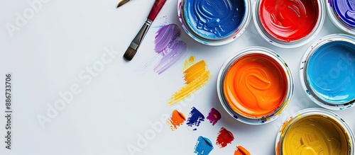 Wallpaper Mural Hobby themed image with various colorful paint cans brushes and white paper background suitable for education and creative pursuits with copy space Torontodigital.ca
