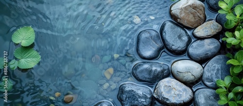 Top view of stones in water featuring a serene Zen vibe with ample copy space image photo