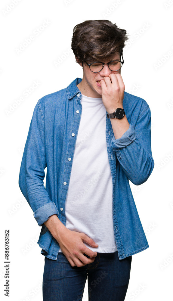 Young handsome man wearing glasses over isolated background looking stressed and nervous with hands on mouth biting nails. Anxiety problem. Young handsome man wearing glasses over isolated background looking stressed and nervous with hands on mouth biting nails. Anxiety problem.