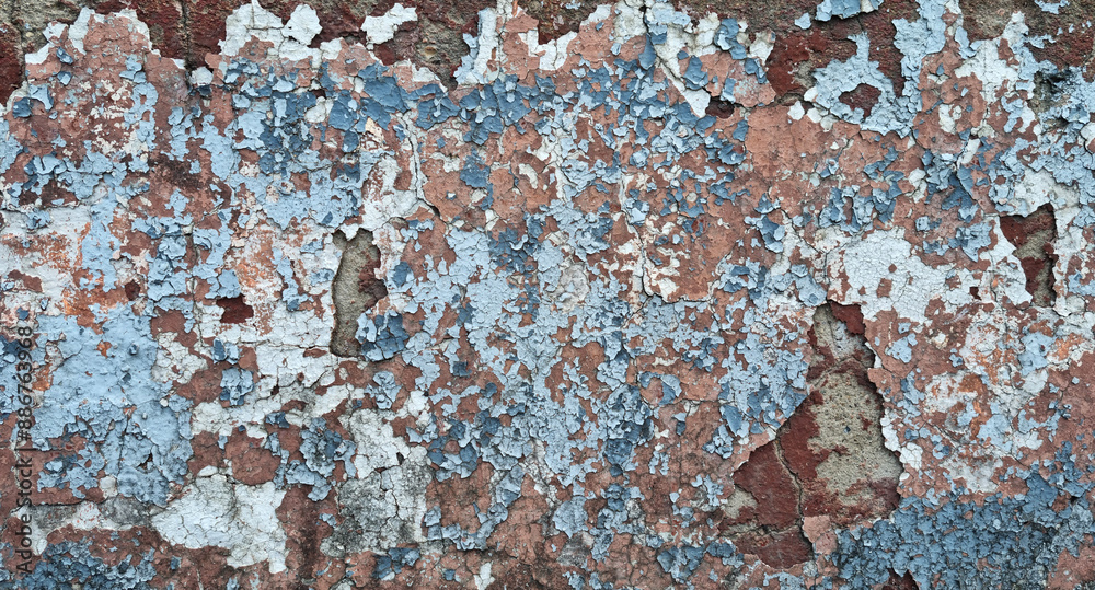Texture of old rustic wall covered with gray and blue stucco. Multilayers of old paint on the wall. Textured background. Selective focus Texture of old rustic wall covered with gray and blue stucco. Multilayers of old paint on the wall. Textured background. Selective focus