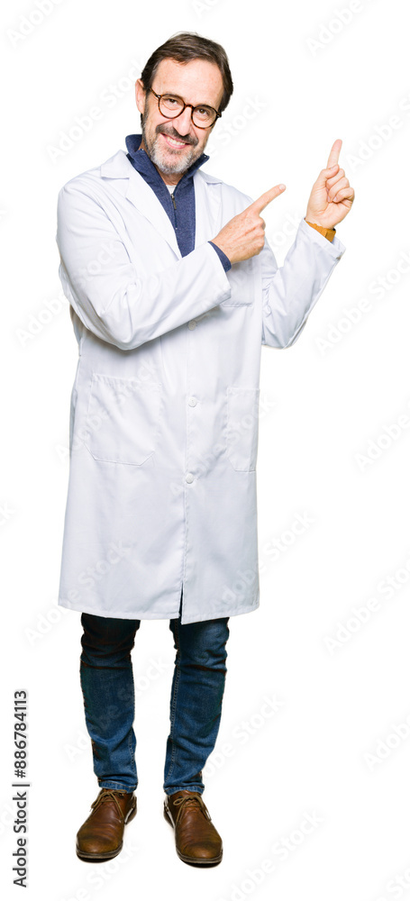 Middle age therapist wearing white coat smiling and looking at the camera pointing with two hands and fingers to the side. Middle age therapist wearing white coat smiling and looking at the camera pointing with two hands and fingers to the side.