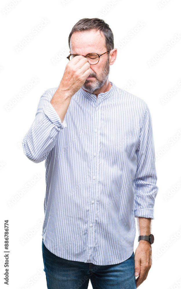 Middle age hoary senior man wearing glasses over isolated background tired rubbing nose and eyes feeling fatigue and headache. Stress and frustration concept. Middle age hoary senior man wearing glasses over isolated background tired rubbing nose and eyes feeling fatigue and headache. Stress and frustration concept.