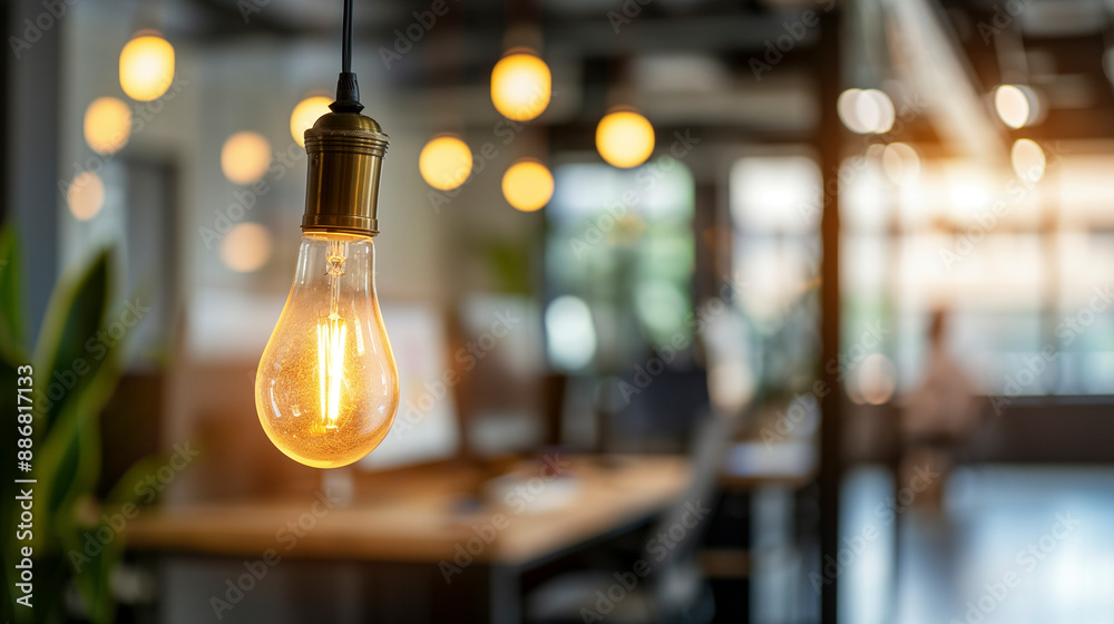 Modern office with warm lighting and stylish decor. Focus on the hated light bulb. Copy space for text Modern office with warm lighting and stylish decor. Focus on the hated light bulb. Copy space for text