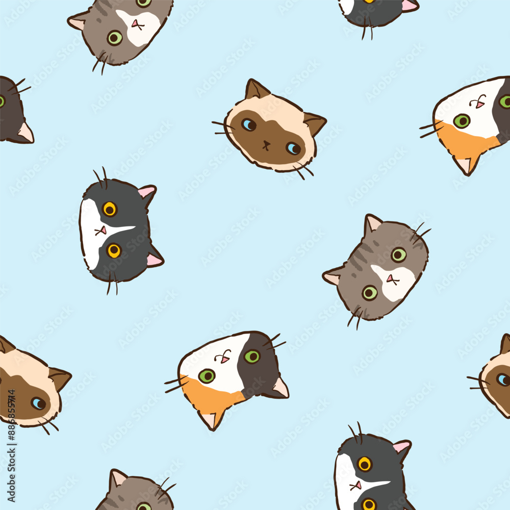 Obraz premium Seamless Pattern with Cartoon Cat Face Design on Light Blue Background