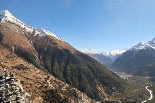 View onto the steep trail from the valley of the Marsyangdi River, Upper, Lower Pisang to the traditional mountain village of Ghyaru in front of Pisang Peak, Annapurna Circuit Trek, Nepal
