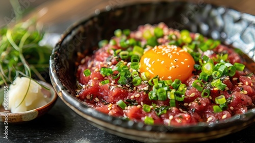 Beef Tartare Korea s unique food Serve with fresh green onions egg yolk Korean pear and sesame oilVery fresh and soft photo