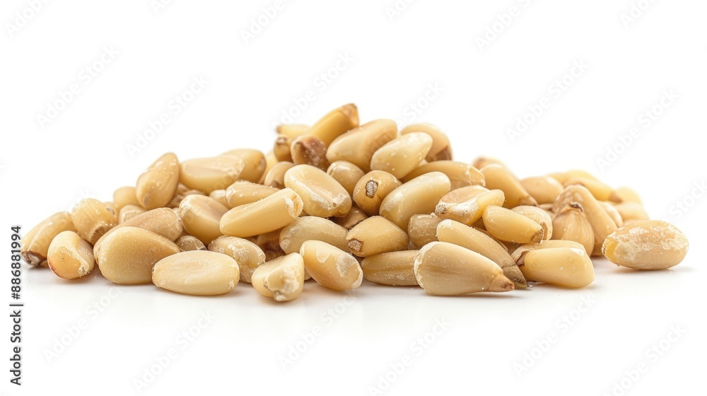 Close up of pine nuts isolated on a white background Close up of pine nuts isolated on a white background