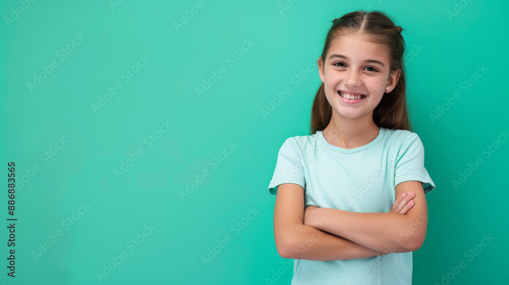 photo of smiling happy girl in front of green background photo of smiling happy girl in front of green background