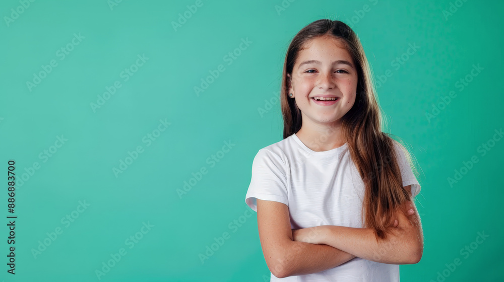 photo of smiling happy girl in front of green background photo of smiling happy girl in front of green background