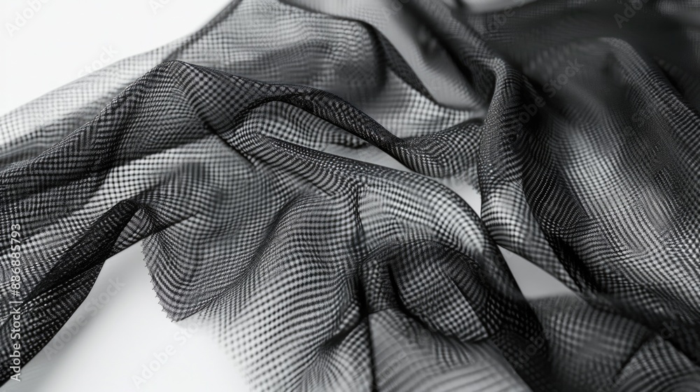 Obraz premium A black and white photograph of a woman wearing a scarf