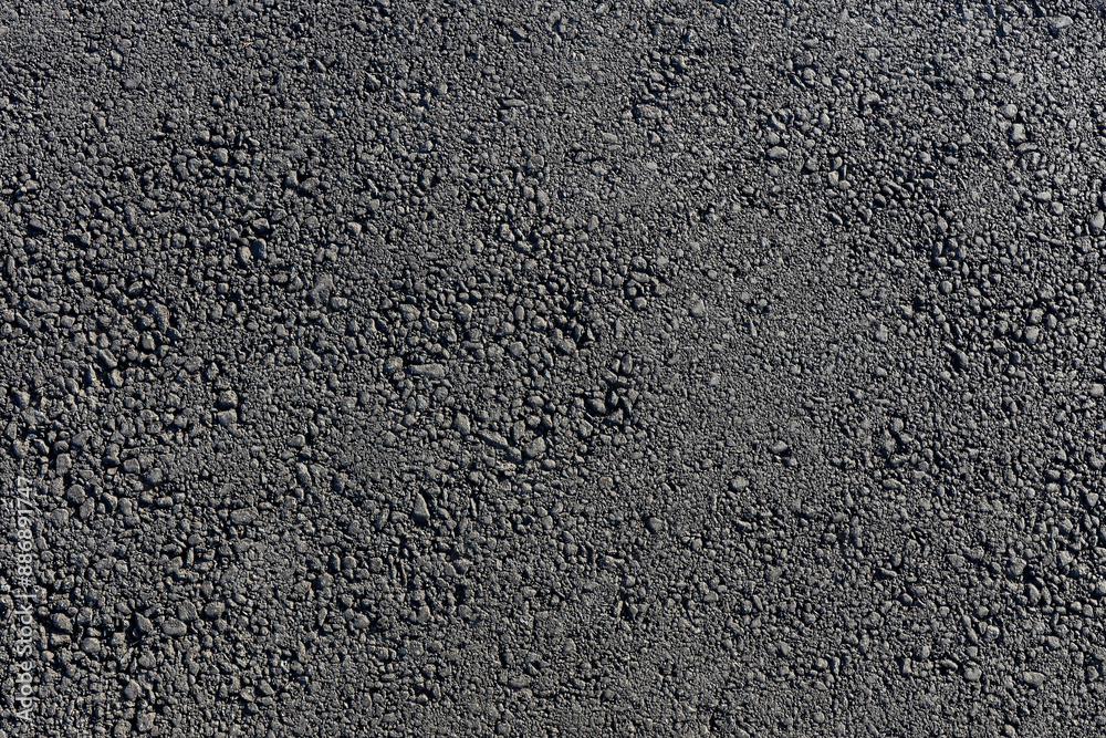 Fototapeta premium Freshly paved asphalt road texture close up