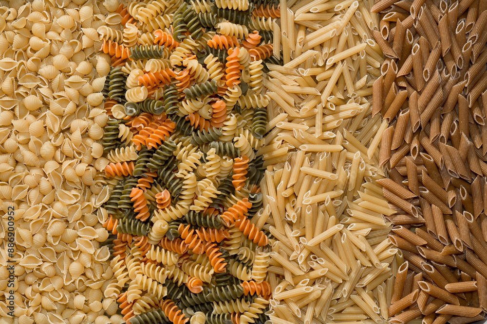 Fototapeta premium Close-up full frame color background photo of various types of uncooked pasta noodles