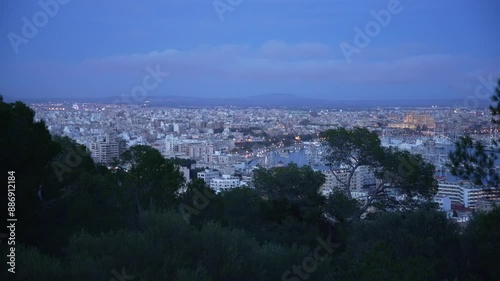 View of Palma skyline and cathedral from Castell de Bellver at dusk, Majorca, Balearic Islands, Spain, Mediterranean, Europe photo