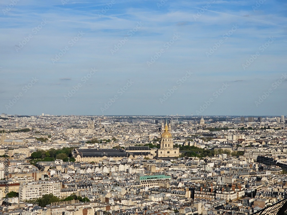 Paris, France - April 12, 2024: Aerial view of crowded Paris skyline with Seine River, Ile de France, France. Panorama view from Eiffel tower to the city skylines. Paris, France - April 12, 2024: Aerial view of crowded Paris skyline with Seine River, Ile de France, France. Panorama view from Eiffel tower to the city skylines.
