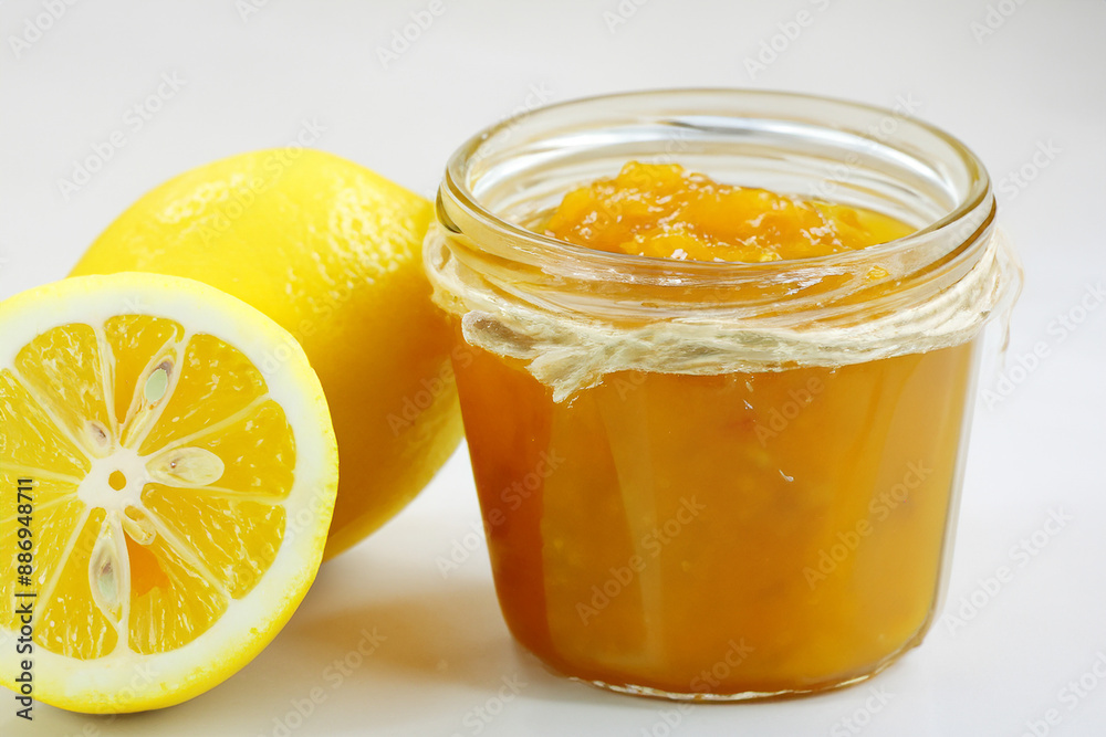 Man is preparing fruit like a lemon. juice fresh bowl concept. a slice of fruit with jam and lemons. a man is preparing a slice of fruit lifestyle with jam and lemons. Man is preparing fruit like a lemon. juice fresh bowl concept. a slice of fruit with jam and lemons. a man is preparing a slice of fruit lifestyle with jam and lemons.