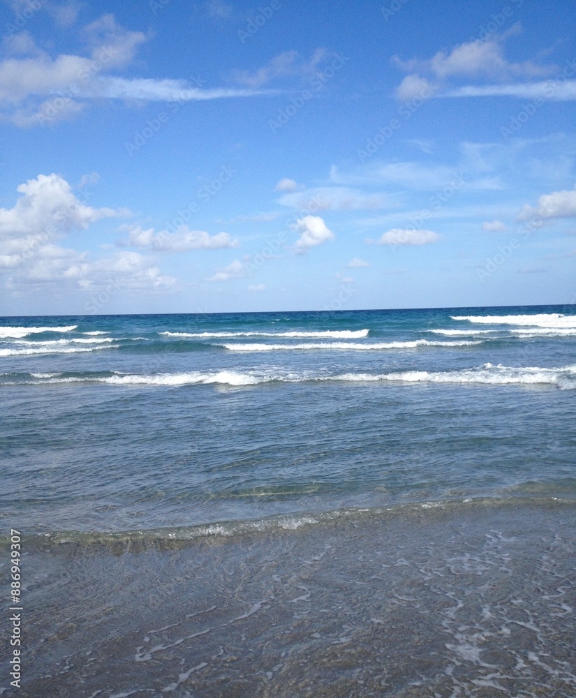 sea and sky
beach
waves
blue sky
clouds
water sea and sky
beach
waves
blue sky
clouds
water