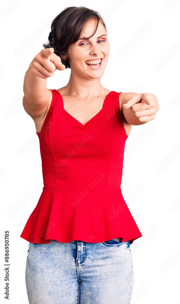 Beautiful young woman with short hair wearing casual style with sleeveless shirt pointing to you and the camera with fingers, smiling positive and cheerful Beautiful young woman with short hair wearing casual style with sleeveless shirt pointing to you and the camera with fingers, smiling positive and cheerful