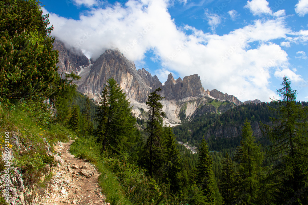 Obraz premium A hiking trail in the Dolomites in Italy South Tyrol with the mountains in the background