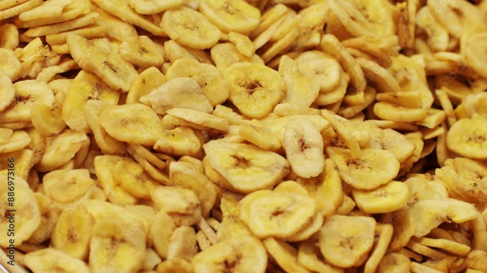 Closeup of Banana Chips shows crispy texture and tasty flavor, perfect for snack lovers Closeup of Banana Chips shows crispy texture and tasty flavor, perfect for snack lovers