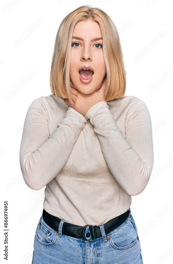 Young blonde woman wearing casual clothes shouting and suffocate because painful strangle. health problem. asphyxiate and suicide concept. Young blonde woman wearing casual clothes shouting and suffocate because painful strangle. health problem. asphyxiate and suicide concept.