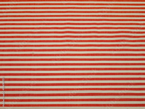 White and red striped thin cotton fabric, background
