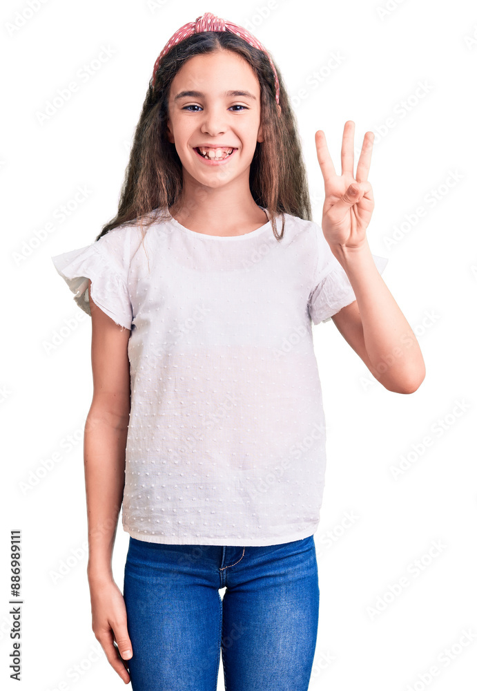 Cute hispanic child girl wearing casual white tshirt showing and pointing up with fingers number three while smiling confident and happy. Cute hispanic child girl wearing casual white tshirt showing and pointing up with fingers number three while smiling confident and happy.