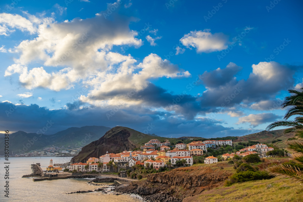 Sunset on Ponta de Sao Lourenco peninsula with traditional resort village. Madeira Island Portugal. Sunset on Ponta de Sao Lourenco peninsula with traditional resort village. Madeira Island Portugal.