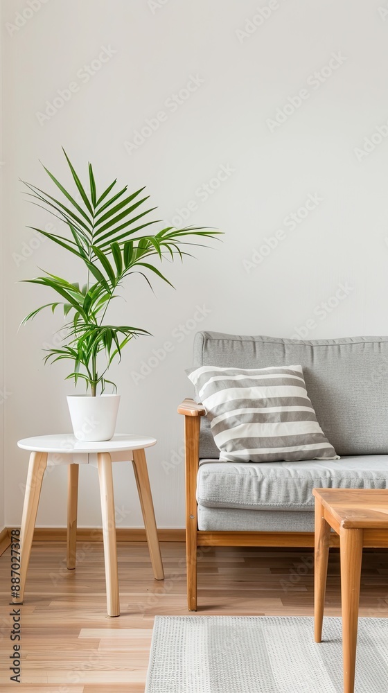 A cream carpet with a floral design is shown in a living room, with three chairs and a coffee table placed on top A cream carpet with a floral design is shown in a living room, with three chairs and a coffee table placed on top
