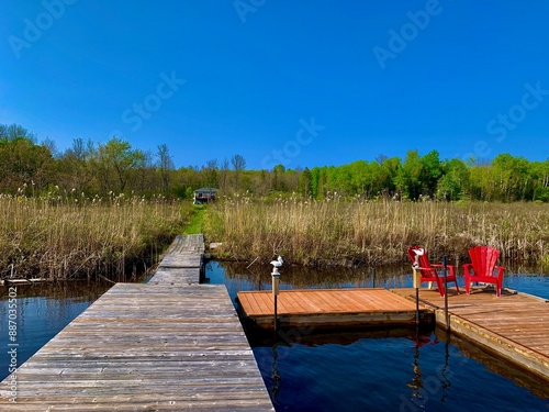 A beautiful view of lake cecebe from a dock beside a cottage in Magnetawan, Ontario. photo