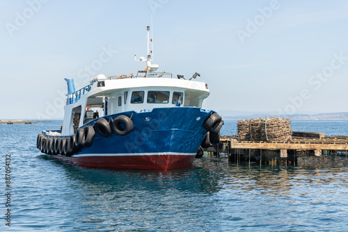 Mussels harvesting operation with a specialized boat
