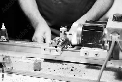 Craftsman repairing billiard cue tip.