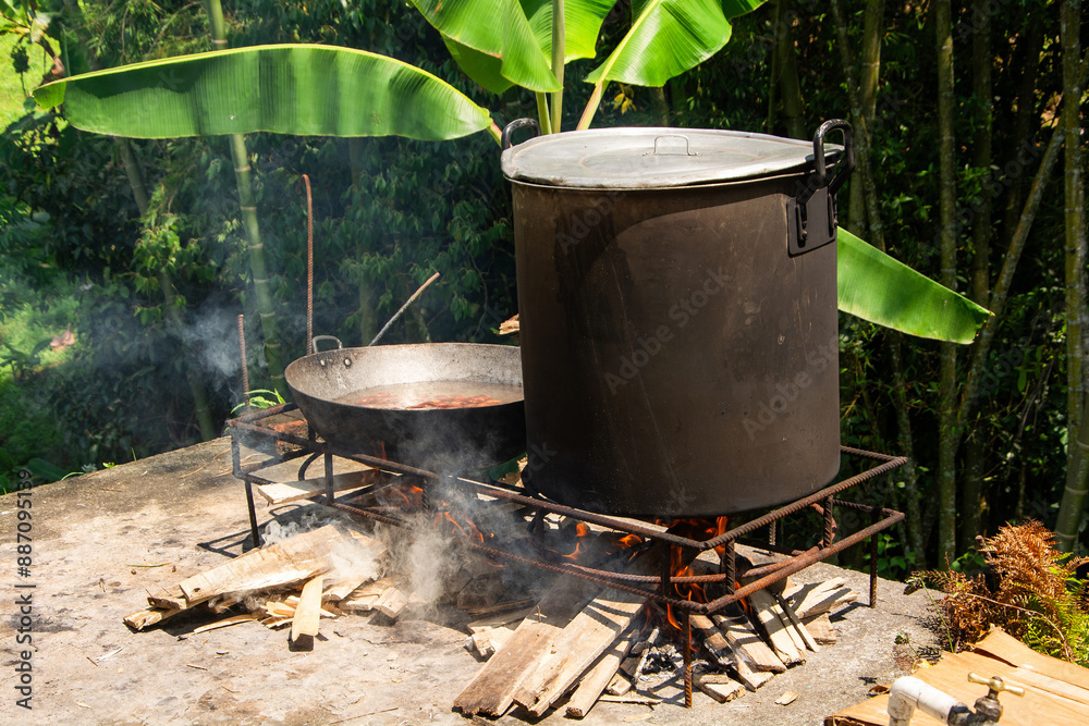 Chicken sancocho made in a wood stove - Typical Colombian tradition Chicken sancocho made in a wood stove - Typical Colombian tradition