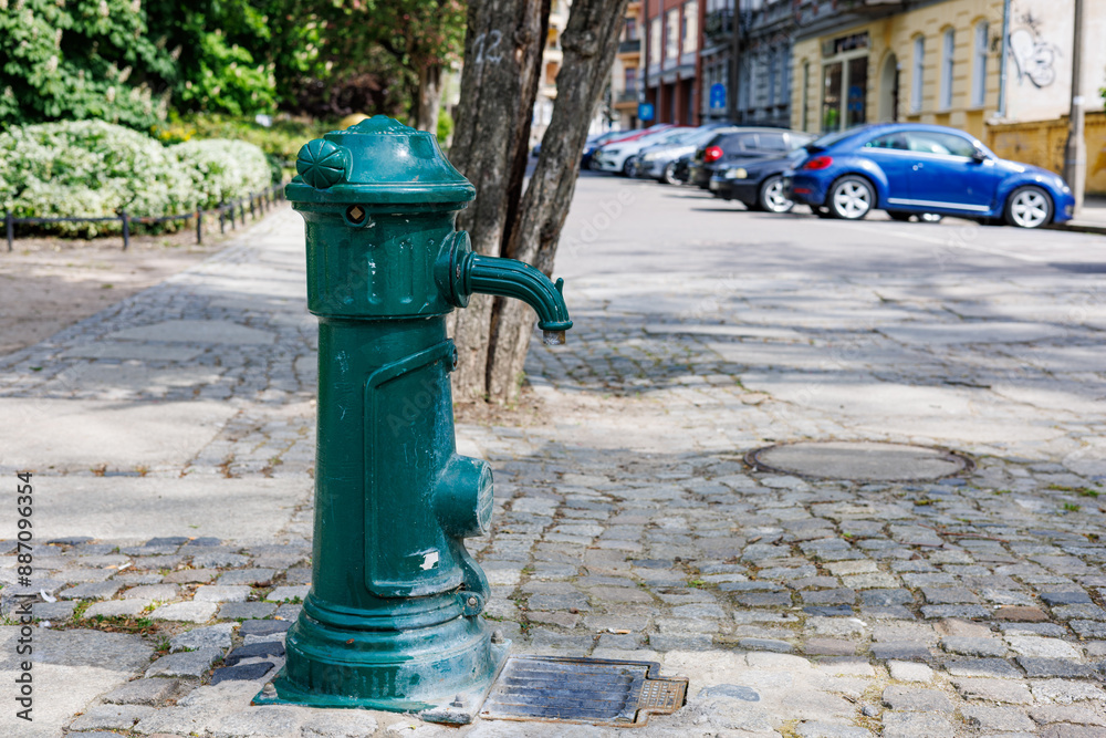 City street standpipe for supplying green water. City street standpipe for supplying green water.