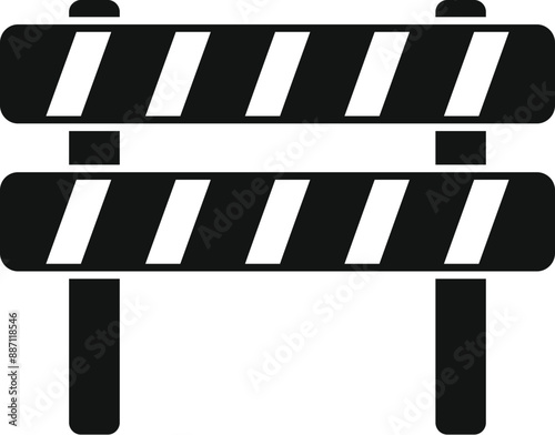 Black and white striped road barrier blocking access