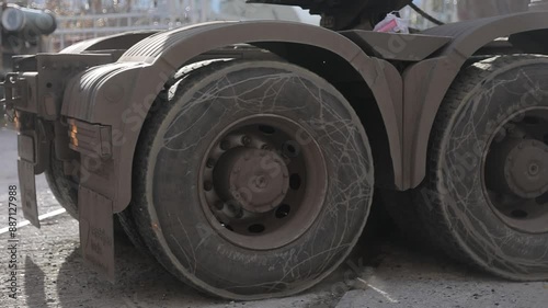 Truck in motion on a dusty road