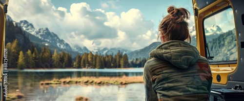 A Woman Looking Out The Back Of A Camper Van, Feeling Adventurous And Free
