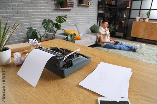 Vintage typewriter with pap...